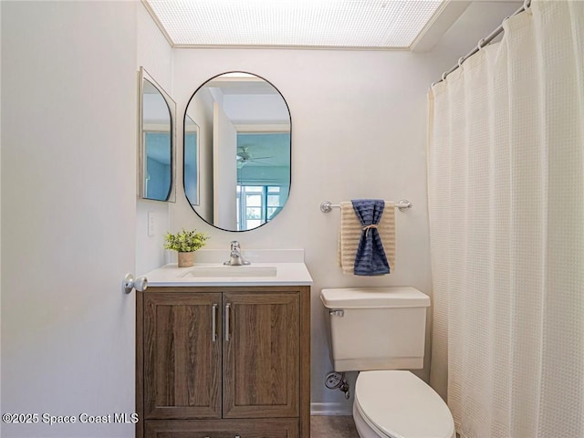 full bath with ceiling fan, toilet, and vanity