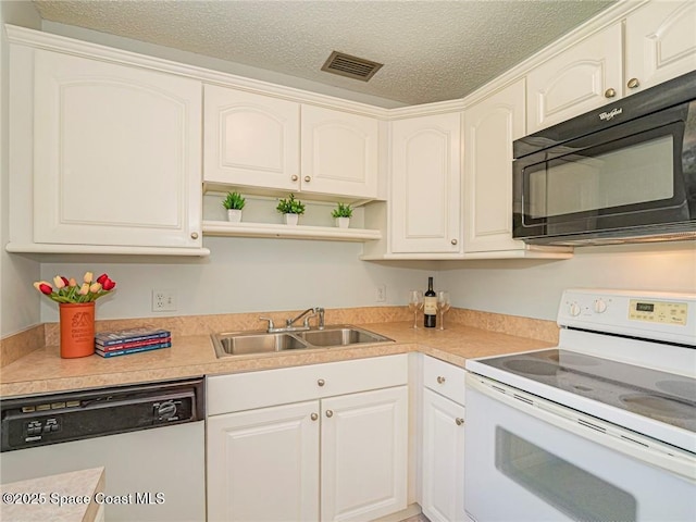 kitchen with white range with electric stovetop, black microwave, dishwasher, a sink, and open shelves