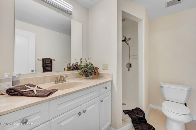 1600 Woodland Dr Unit 4206, Rockledge, FL 32955 - full bathroom with toilet, vanity, tiled shower, tile patterned floors, and baseboards