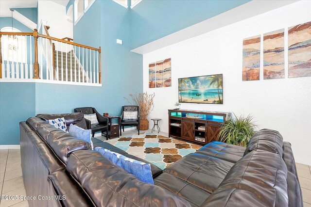 2648 Daulby St, Kissimmee, FL 34747 - tiled living area featuring a high ceiling