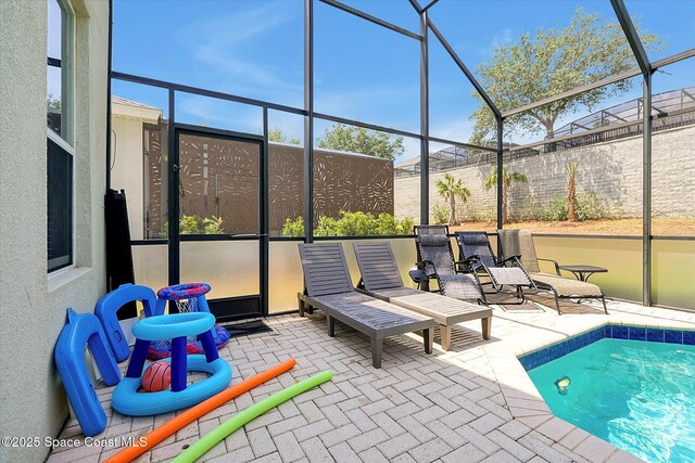 2648 Daulby St, Kissimmee, FL 34747 - swimming pool featuring a patio area