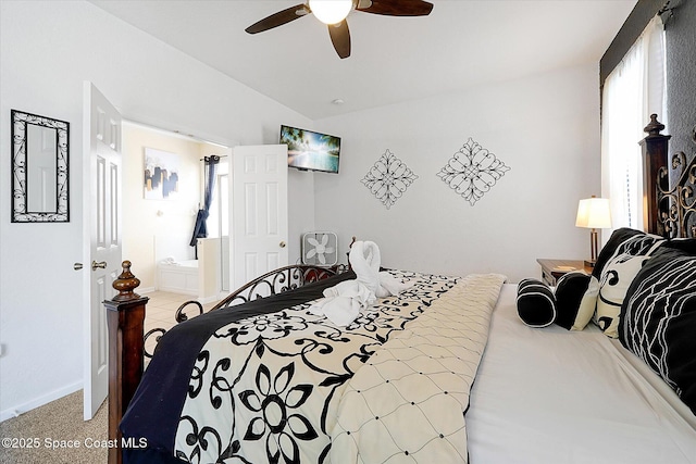 2648 Daulby St, Kissimmee, FL 34747 - bedroom with lofted ceiling, light carpet, ceiling fan, and ensuite bath