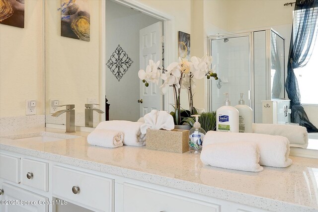 2648 Daulby St, Kissimmee, FL 34747 - bathroom with a stall shower and vanity