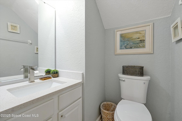 2648 Daulby St, Kissimmee, FL 34747 - half bath with toilet, lofted ceiling, and vanity