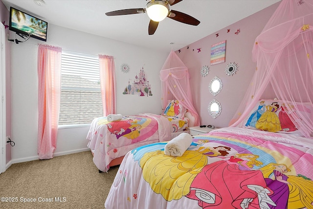 2648 Daulby St, Kissimmee, FL 34747 - bedroom featuring carpet flooring, a ceiling fan, and baseboards