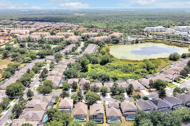 2648 Daulby St, Kissimmee, FL 34747 - aerial perspective of suburban area with a forest and a large body of water