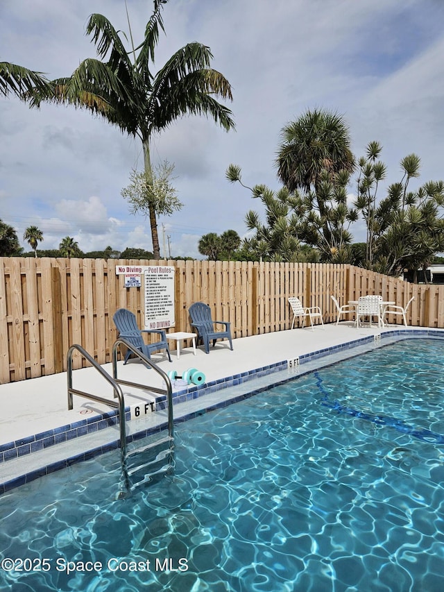 1700 S Atlantic Ave Unit 107, Cocoa Beach, FL 32931 - community pool with a patio