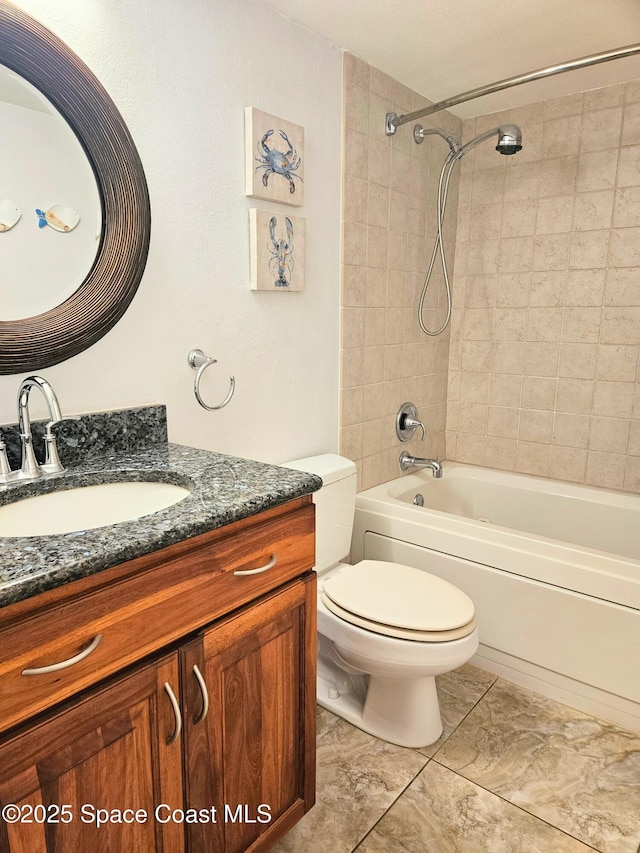 1700 S Atlantic Ave Unit 107, Cocoa Beach, FL 32931 - full bathroom with vanity, toilet, and tub / shower combination