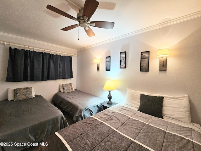 1700 S Atlantic Ave Unit 107, Cocoa Beach, FL 32931 - bedroom with crown molding and a ceiling fan