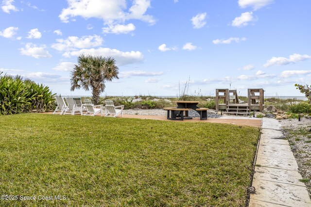 1145 S Atlantic Ave Unit B, Cocoa Beach, FL 32931 - view of grassy yard