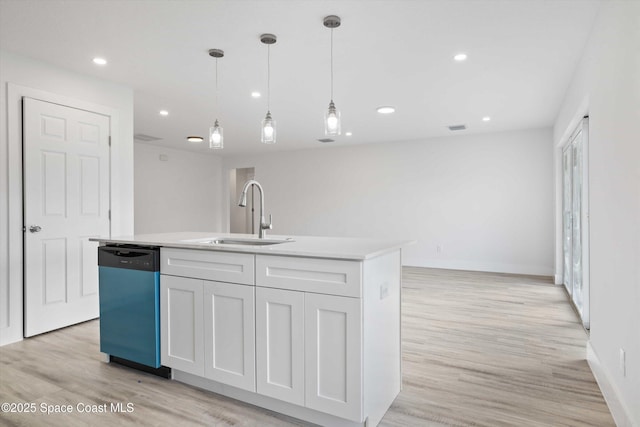 3258 Forghun Ave SE, Palm Bay, FL 32909 - kitchen with dishwasher, a sink, light wood-type flooring, hanging light fixtures, and baseboards
