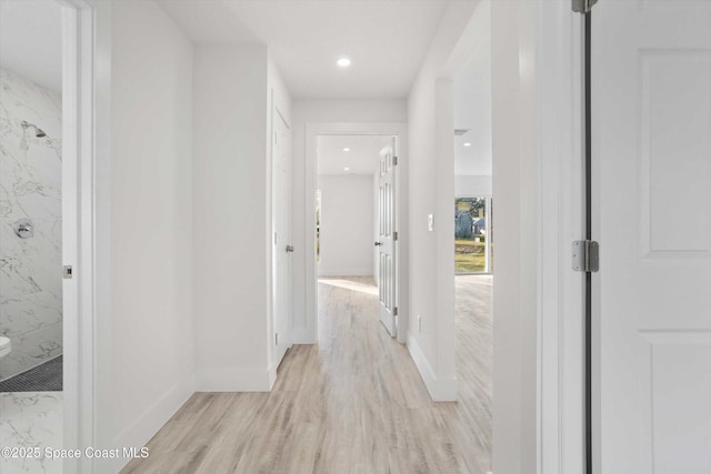 3258 Forghun Ave SE, Palm Bay, FL 32909 - hall featuring light wood finished floors, recessed lighting, and baseboards