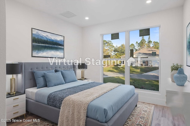 3258 Forghun Ave SE, Palm Bay, FL 32909 - bedroom with wood finished floors and recessed lighting
