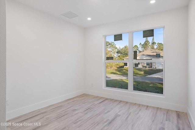 3258 Forghun Ave SE, Palm Bay, FL 32909 - unfurnished room featuring wood finished floors, recessed lighting, and baseboards