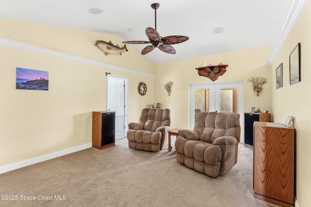 living room with french doors, lofted ceiling, carpet floors, ceiling fan, and baseboards