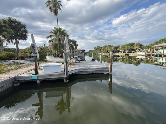 dock area featuring a water view