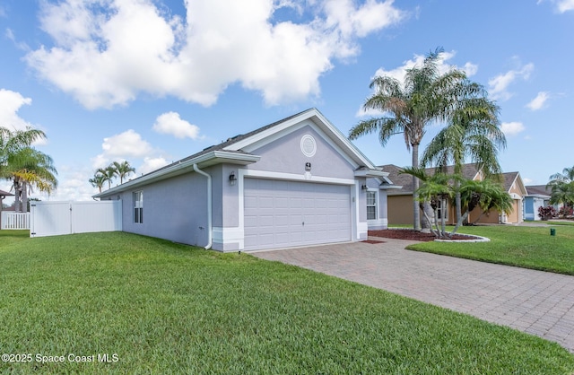 single story home featuring a garage, stucco siding, and driveway