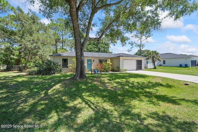 single story home featuring driveway and an attached garage