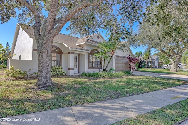 2805 Forest Run Dr, Melbourne, FL 32935 - view of front of house featuring stucco siding, a garage, a front lawn, and driveway