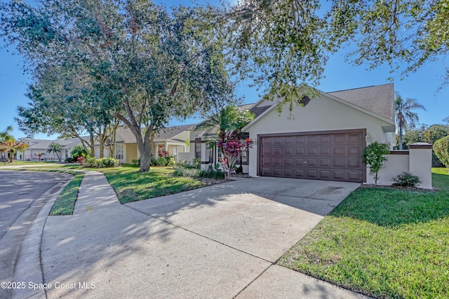 2805 Forest Run Dr, Melbourne, FL 32935 - ranch-style house featuring stucco siding, an attached garage, driveway, and a front yard