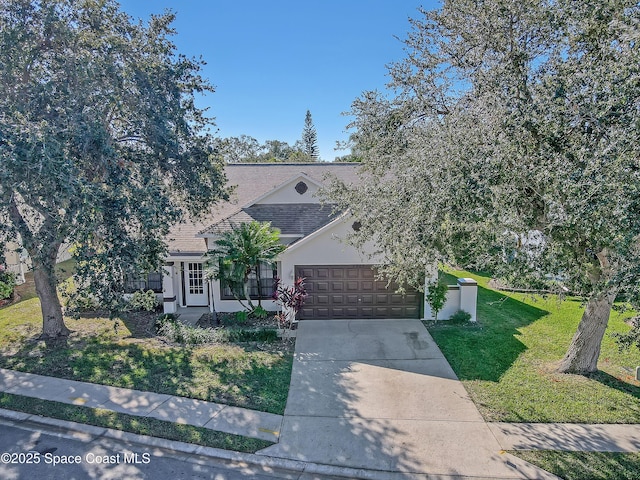 2805 Forest Run Dr, Melbourne, FL 32935 - obstructed view of property featuring stucco siding, roof with shingles, an attached garage, a front yard, and concrete driveway