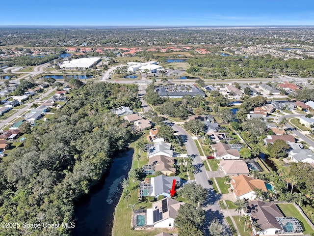 2805 Forest Run Dr, Melbourne, FL 32935 - aerial view of property's location with nearby suburban area and a nearby body of water