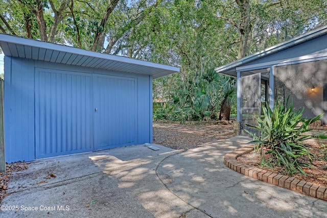 690 Koutnik Rd SE, Palm Bay, FL 32909 - garage with a shed