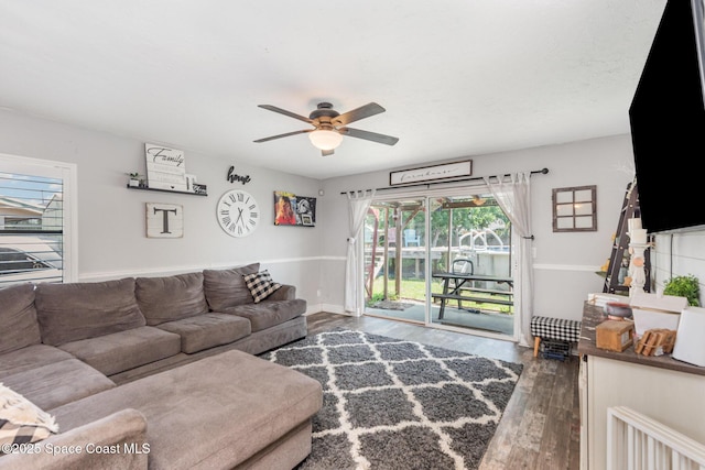 958 Beaumont Ln, Rockledge, FL 32955 - living area featuring wood finished floors and a ceiling fan
