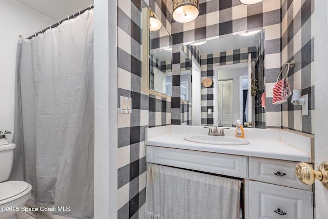 958 Beaumont Ln, Rockledge, FL 32955 - full bathroom with toilet, wallpapered walls, vanity, and curtained shower