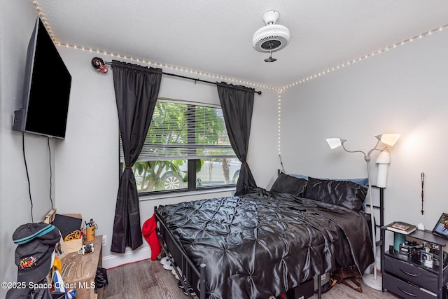 958 Beaumont Ln, Rockledge, FL 32955 - bedroom with wood finished floors and baseboards