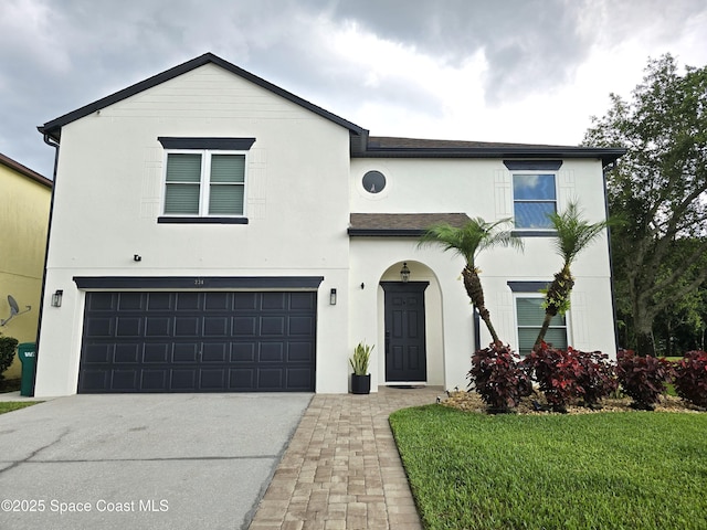 334 Dryden Cir, Cocoa, FL 32926 - view of front of house featuring an attached garage, driveway, and stucco siding