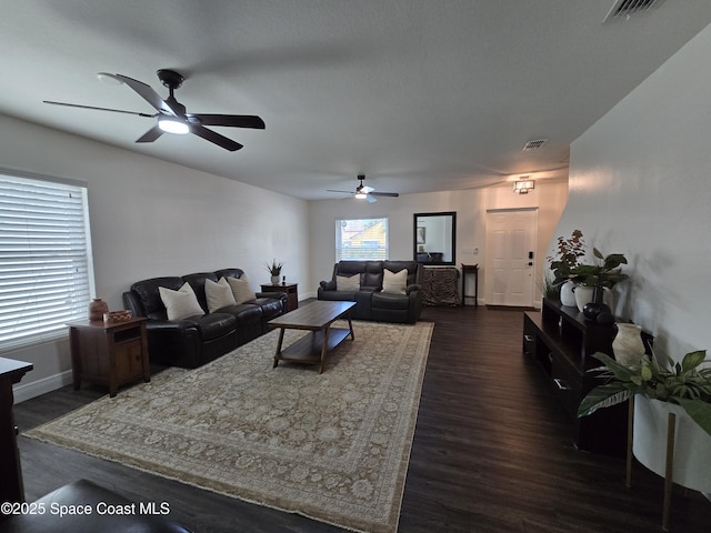334 Dryden Cir, Cocoa, FL 32926 - living room with a ceiling fan, dark wood-style floors, and baseboards