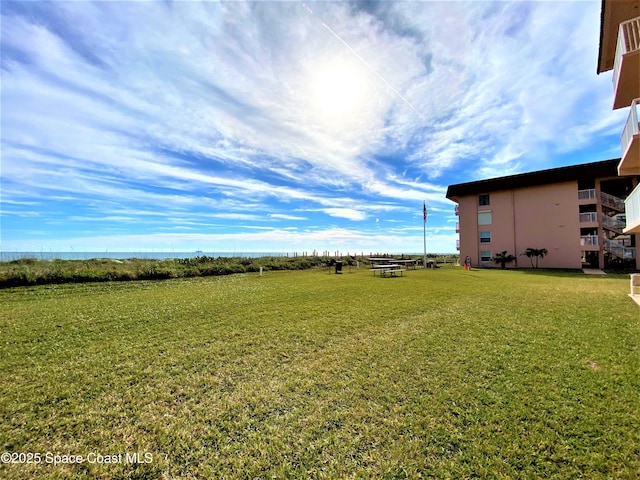 35 Sunflower St Unit 59, Cocoa Beach, FL 32931 - view of grassy yard