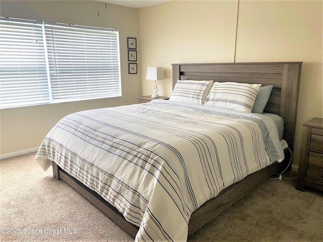 35 Sunflower St Unit 59, Cocoa Beach, FL 32931 - bedroom featuring carpet floors and baseboards
