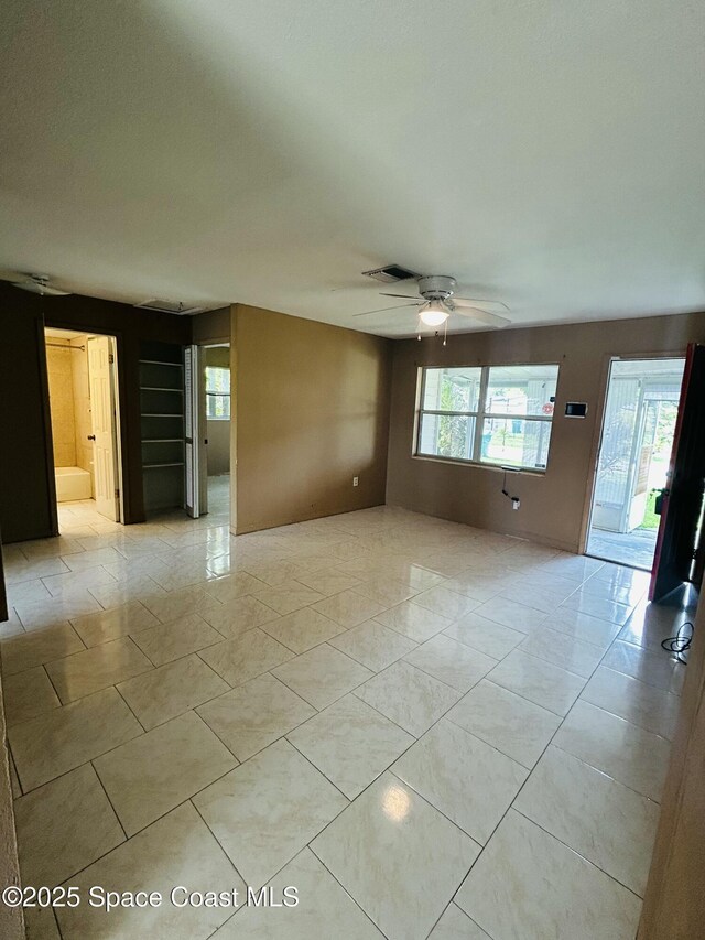 2174 Woodbury Rd, Melbourne, FL 32935 - spare room featuring ceiling fan