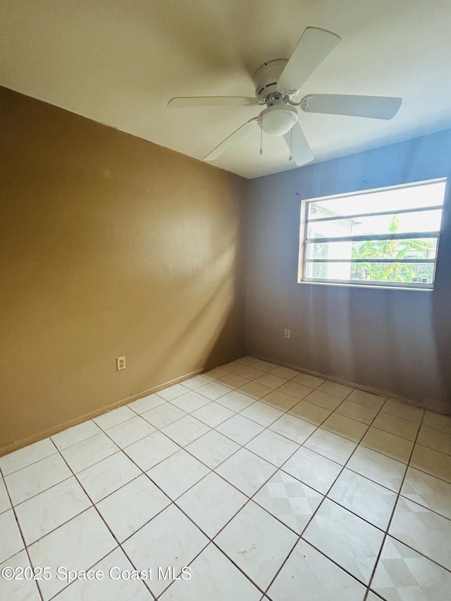 2174 Woodbury Rd, Melbourne, FL 32935 - empty room featuring ceiling fan and light tile patterned floors
