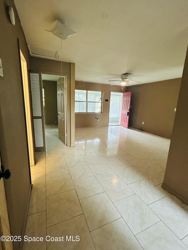 2174 Woodbury Rd, Melbourne, FL 32935 - empty room with a ceiling fan