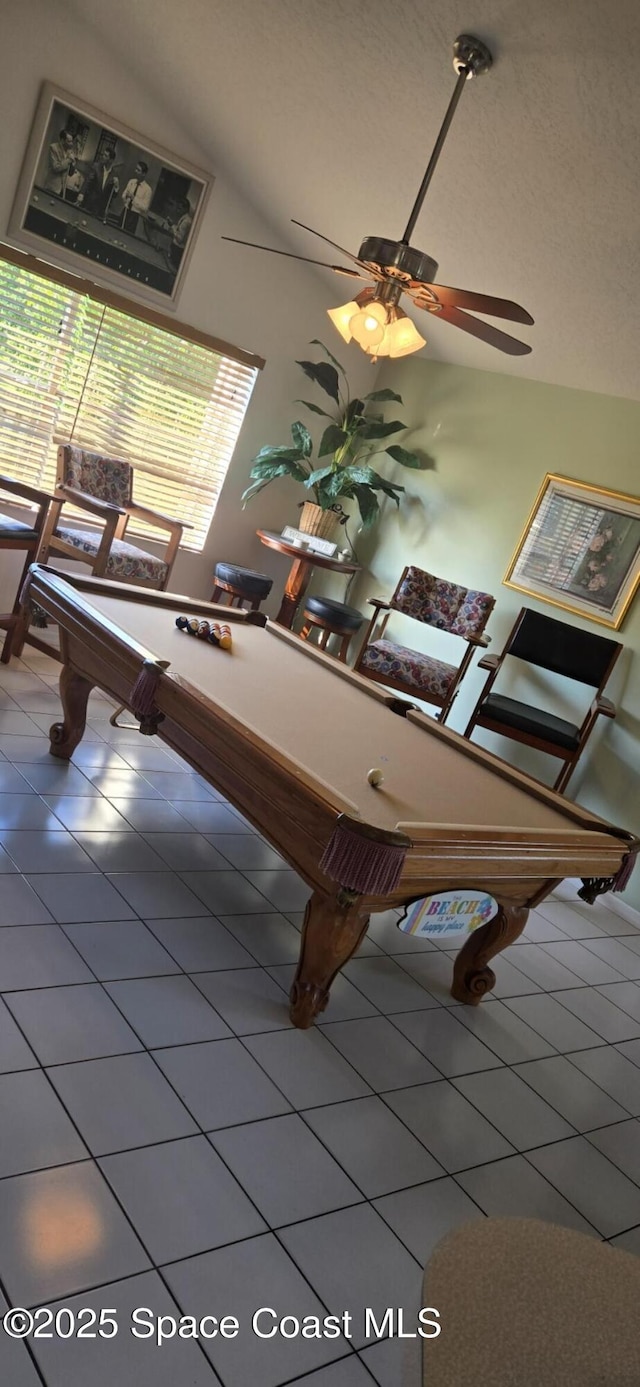 rec room featuring lofted ceiling, billiards, tile patterned flooring, and ceiling fan