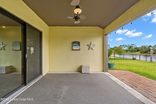 3575 Salt Marsh Cir, West Melbourne, FL 32904 - view of patio / terrace with a water view and ceiling fan