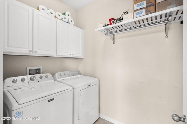 3575 Salt Marsh Cir, West Melbourne, FL 32904 - laundry room with cabinet space, separate washer and dryer, and baseboards