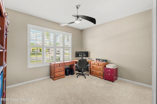 3575 Salt Marsh Cir, West Melbourne, FL 32904 - carpeted office featuring a ceiling fan and baseboards