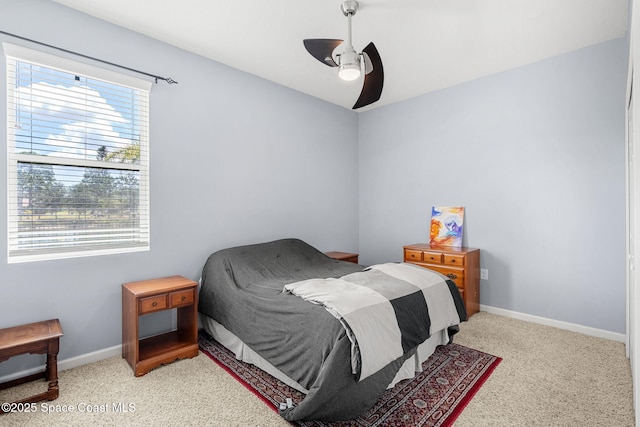 3575 Salt Marsh Cir, West Melbourne, FL 32904 - bedroom with light colored carpet, baseboards, and ceiling fan