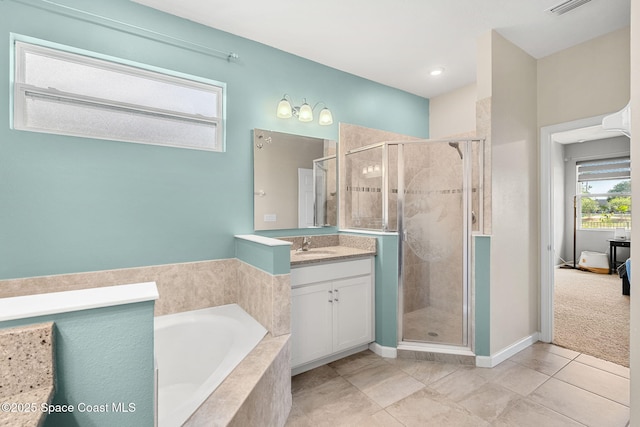 3575 Salt Marsh Cir, West Melbourne, FL 32904 - bathroom with a stall shower, a bath, tile patterned flooring, vanity, and baseboards