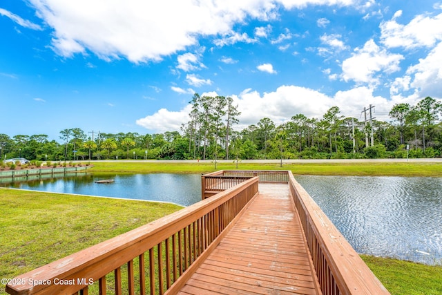 3575 Salt Marsh Cir, West Melbourne, FL 32904 - dock featuring a water view, a yard, and view of scattered trees