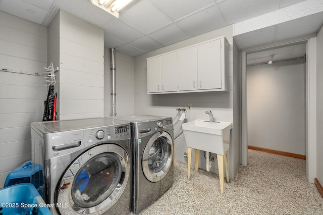 2318 Country Club Rd, Melbourne, FL 32901 - laundry room featuring washing machine and dryer, cabinet space, and baseboards