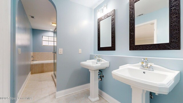 2287 Venetia Pl, Indialantic, FL 32903 - full bathroom featuring a garden tub and tile patterned floors