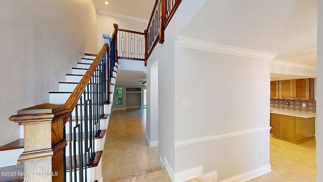 2287 Venetia Pl, Indialantic, FL 32903 - stairway featuring crown molding, tile patterned flooring, and recessed lighting