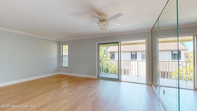 2287 Venetia Pl, Indialantic, FL 32903 - unfurnished room with light wood finished floors, ornamental molding, and ceiling fan