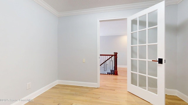 2287 Venetia Pl, Indialantic, FL 32903 - unfurnished room featuring crown molding and wood finished floors