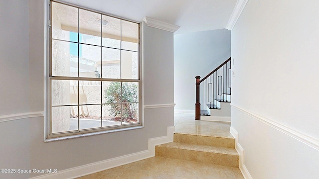 2287 Venetia Pl, Indialantic, FL 32903 - stairway with plenty of natural light, ornamental molding, and tile patterned flooring